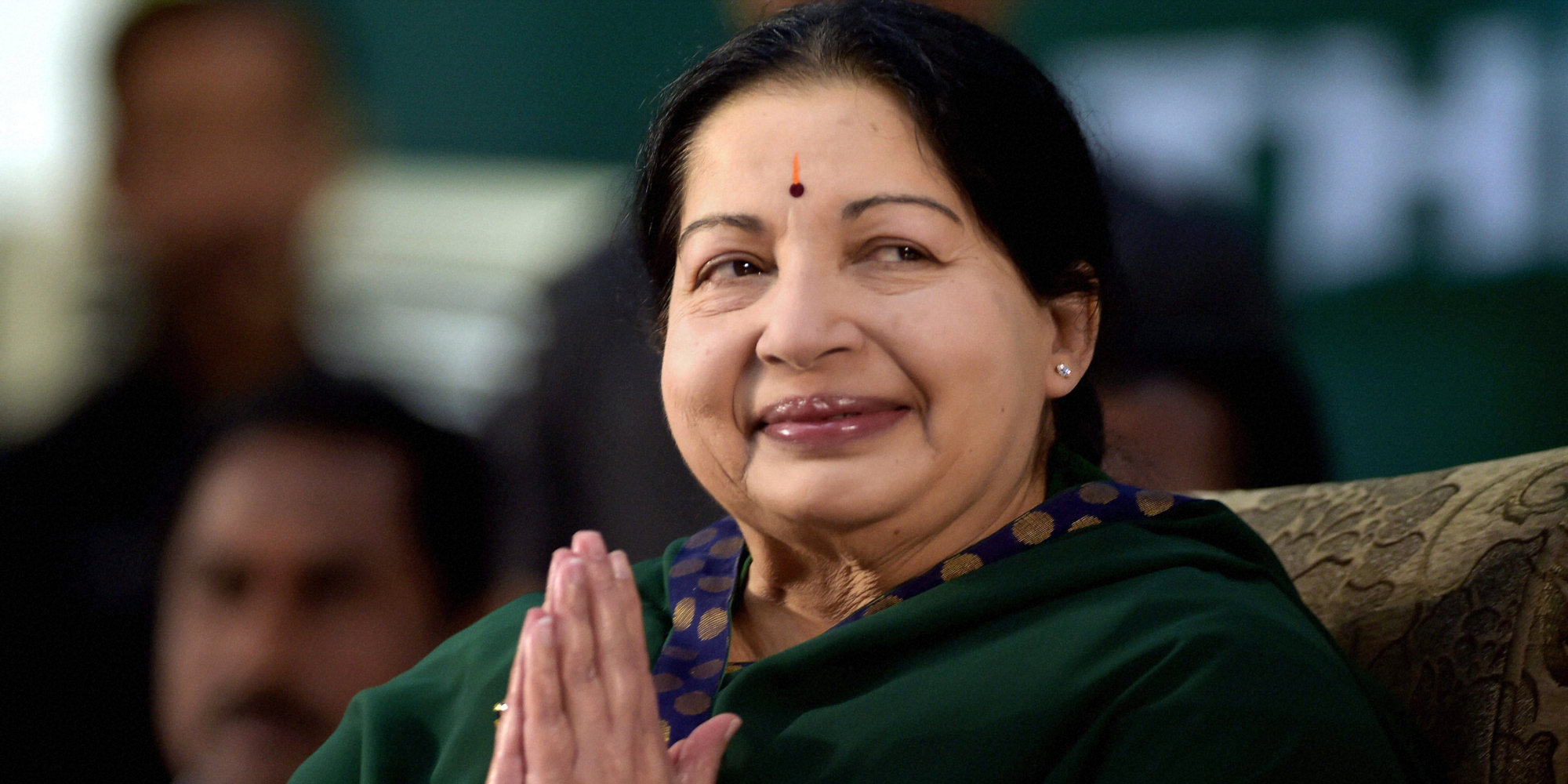 AIADMK leader Jayaram Jayalalitha greets the audience during her swearing-in-ceremony as the Chief Minister of Tamil Nadu state in Chennai, India, Saturday, May 23, 2015. An appeals court acquitted the powerful politician in southern India of corruption charges earlier this month, clearing the way for her to return to public office. She was forced last year to step down as the highest elected official in Tamil Nadu after a Bangalore court in September convicted her of possessing wealth disproportionate to her income and sentenced her to four years in prison. (R. Senthil Kumar/ Press Trust of India via AP)